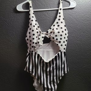 No Boundaries one piece swimsuit suit. Polka-dot $striped, black and white